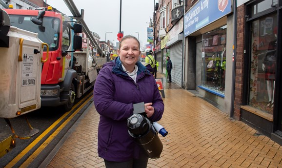 Cllr Samantha Deakin with a CCTV camera on Outram Street  