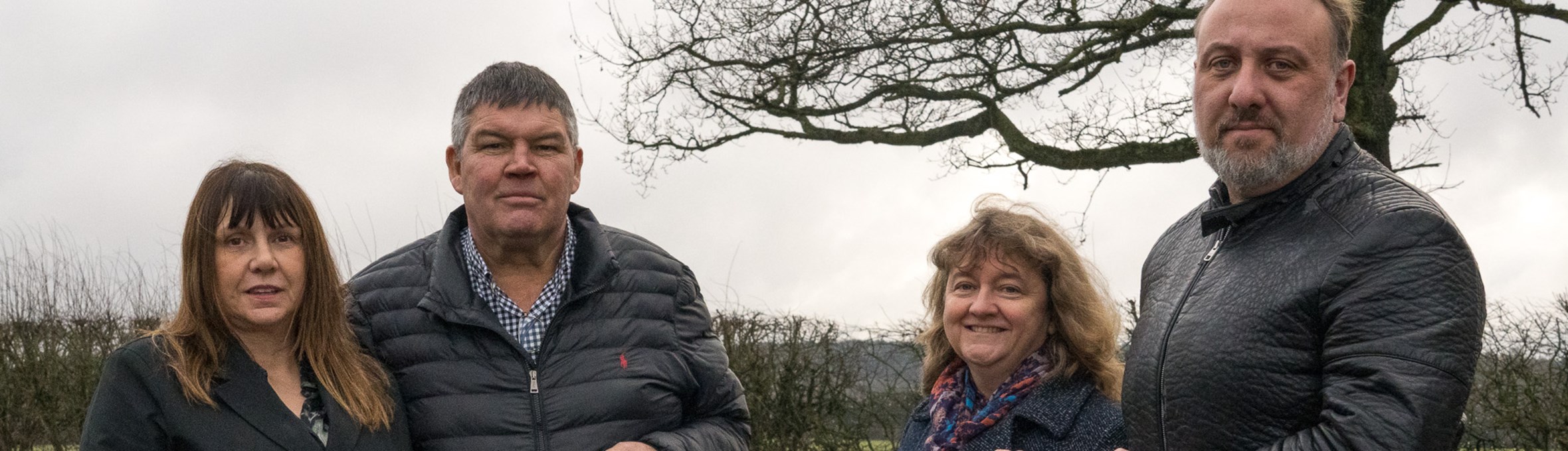 Cllr Chris Huskinson and Assistant Director Christine Sarris, with Roger and Janet Hartshorn