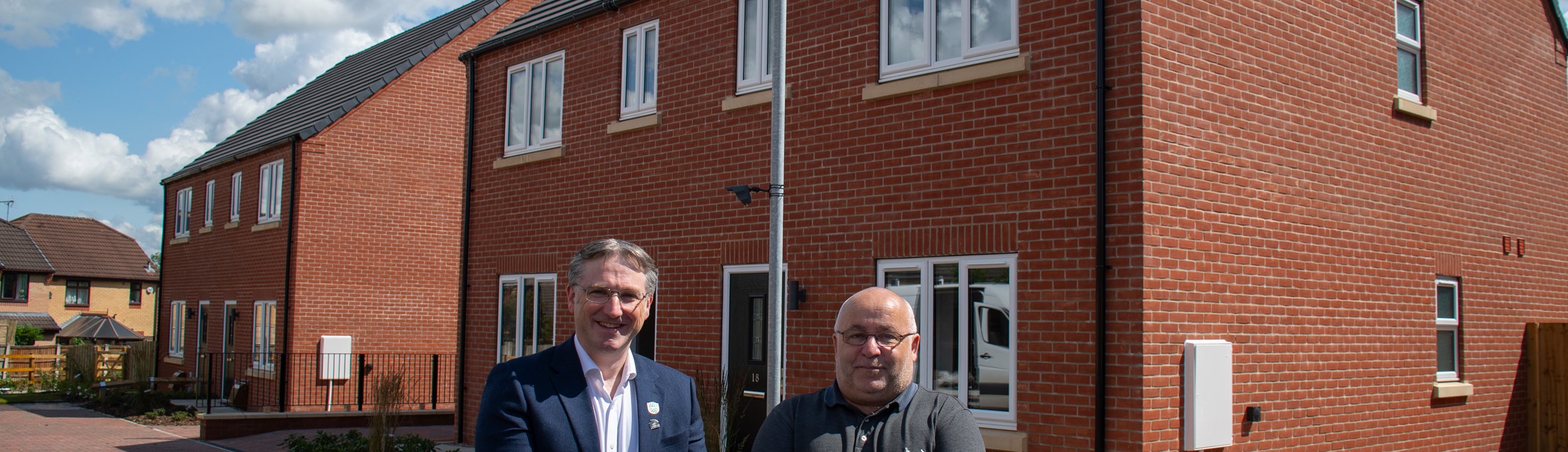 Cllr Matt Relf with Cllr Andy Meakin outside new homes on Charlotte Gardens 