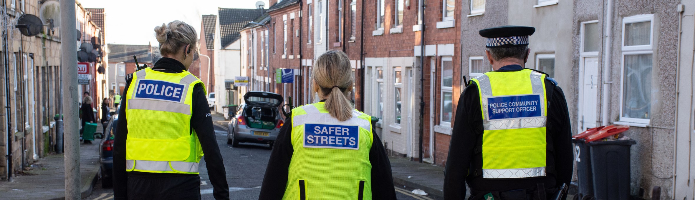 Police officer and community protection officers patrolling the streets