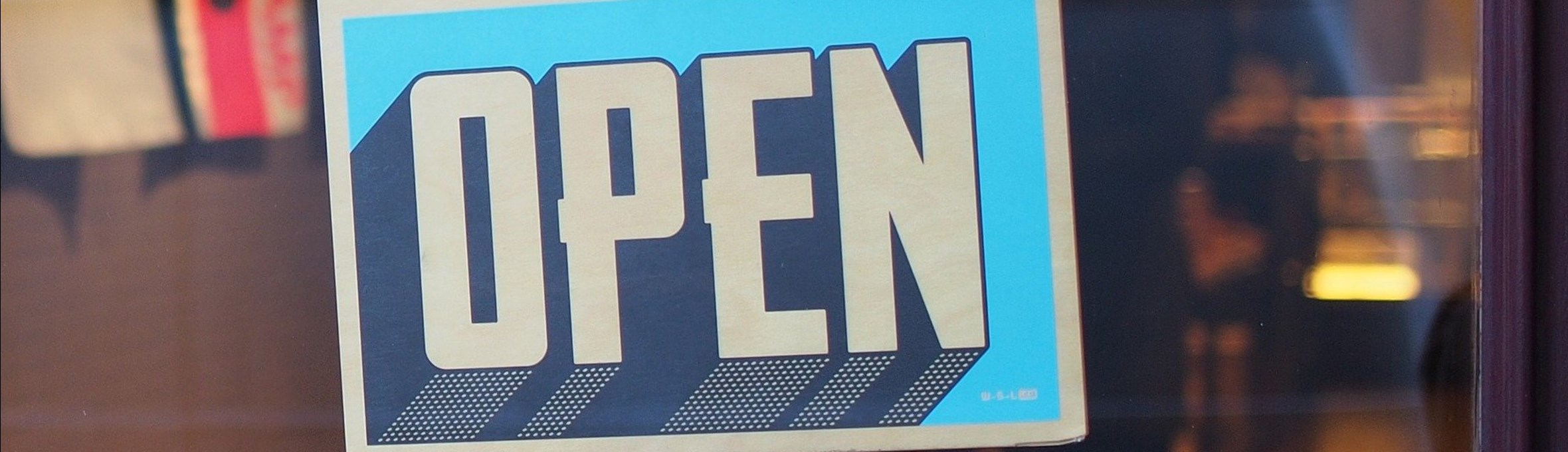 Open sign in a window