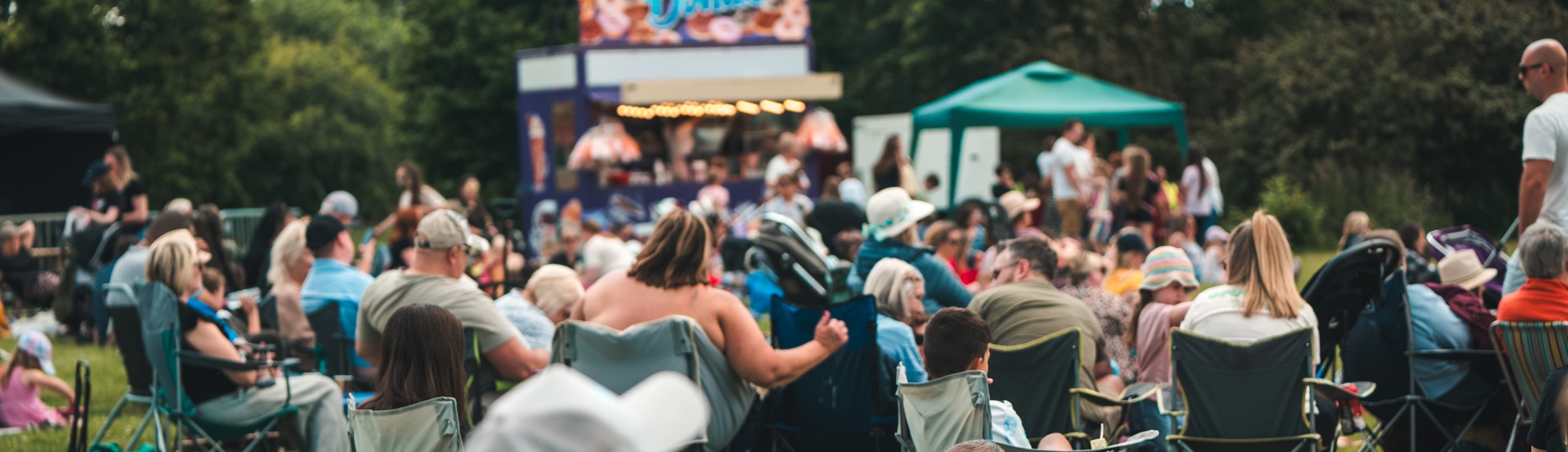 People watching a film at a previous year's Films in the Park