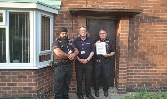 Police, Community Support and Anti- Social Behaviour officers closing the flat.