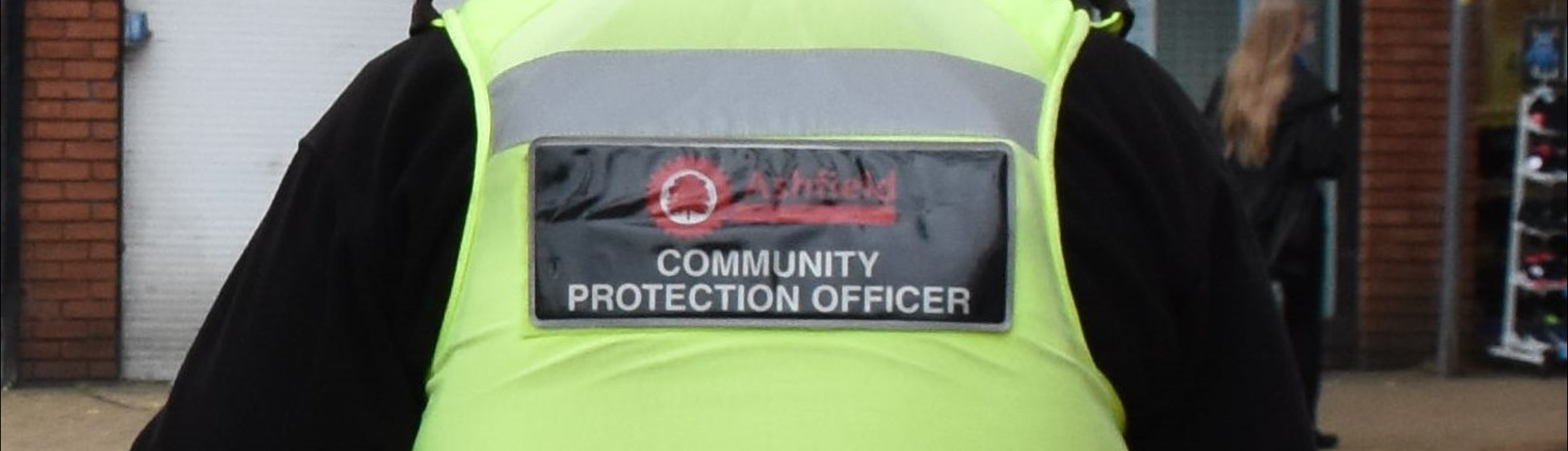 A council community protection officer in a high vis vest 