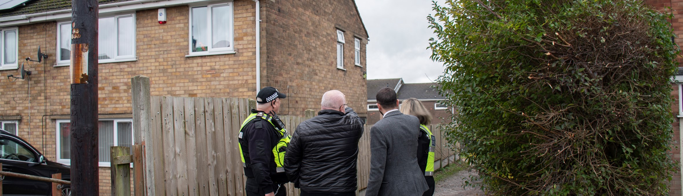 Councillors and CPOs inspect an alleyway