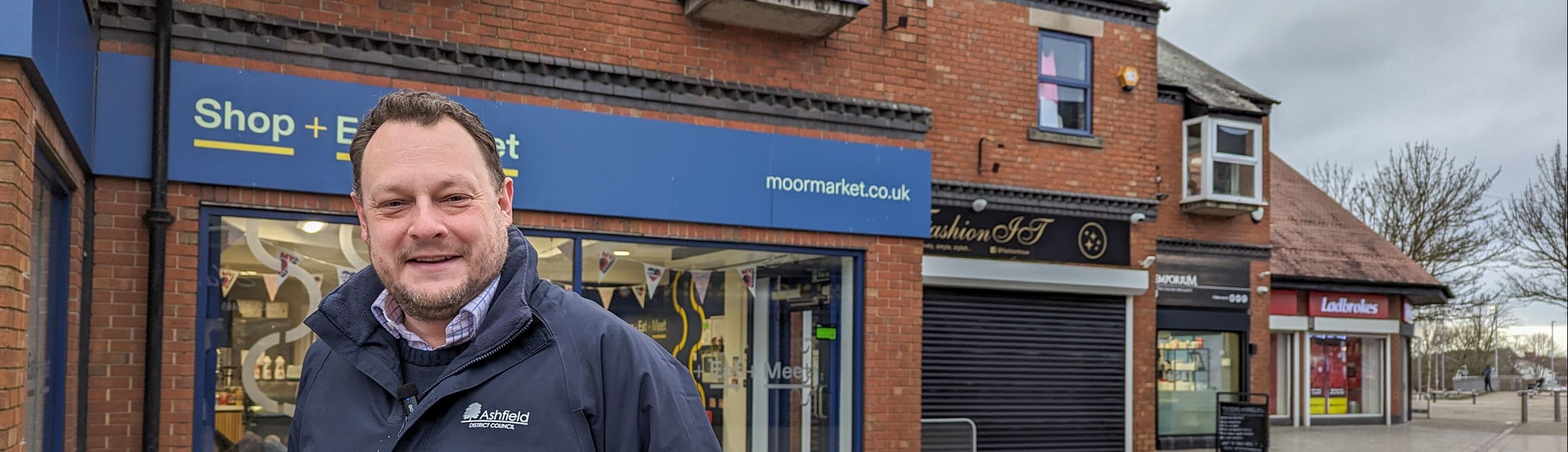 Cllr Jason Zadrozny outside moor market in kirkby 