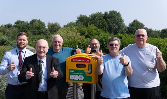 Wighay allotment holders pictured with Ashfield councillors, ADC staff and the defibrillator