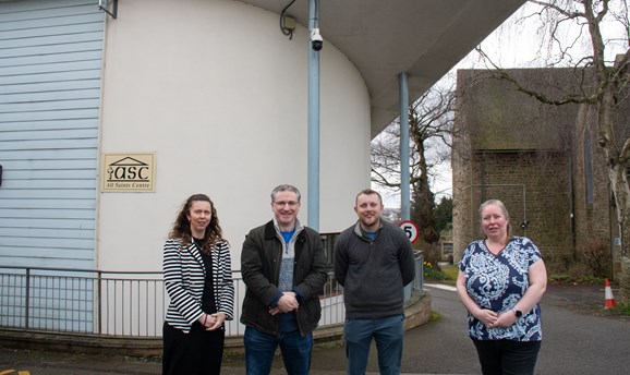 Two women and two men stand in front of the All Saints Community centre in Huthwaite
