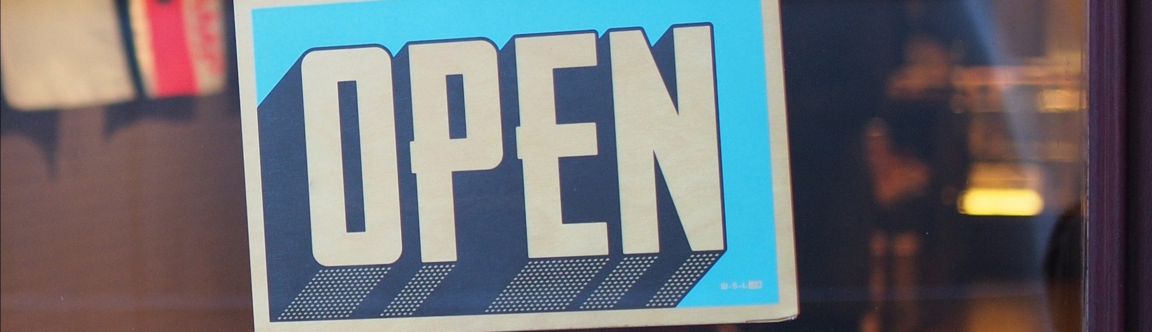 Open sign in a shop door
