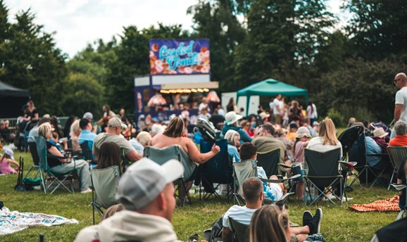 Films in the Park written on a blue sky